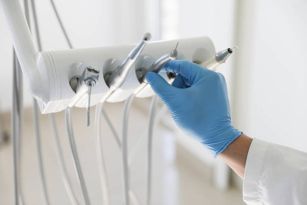 Professional Tooth Extraction technician working in Walcott, IA
